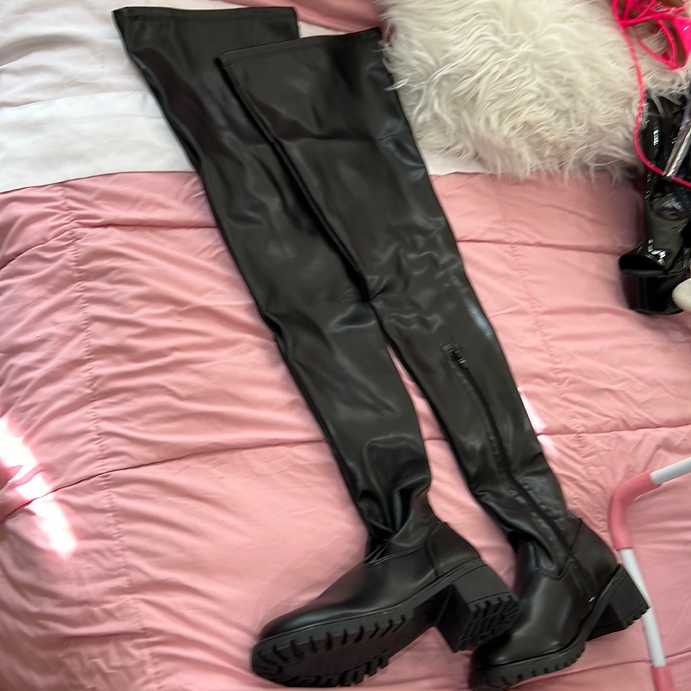 Black leather thigh high boots